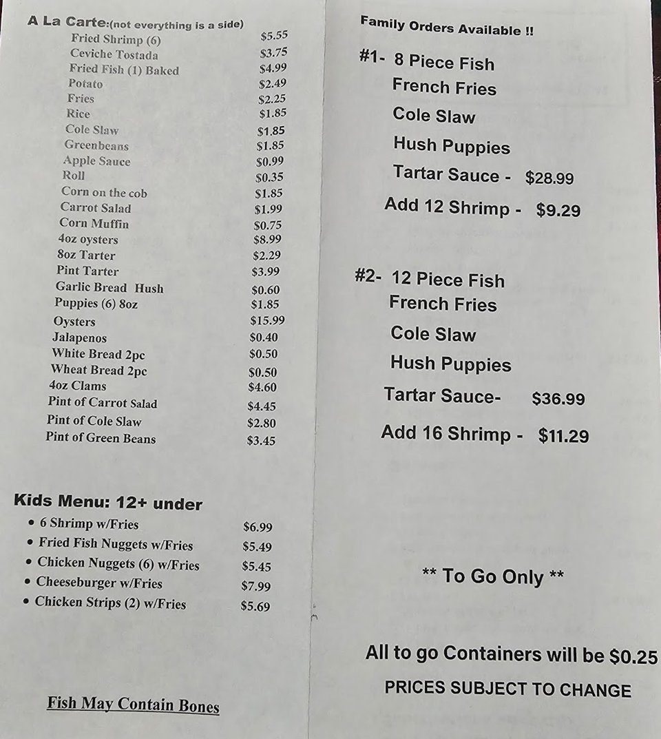 Printed menu with salads and fried shrimp.